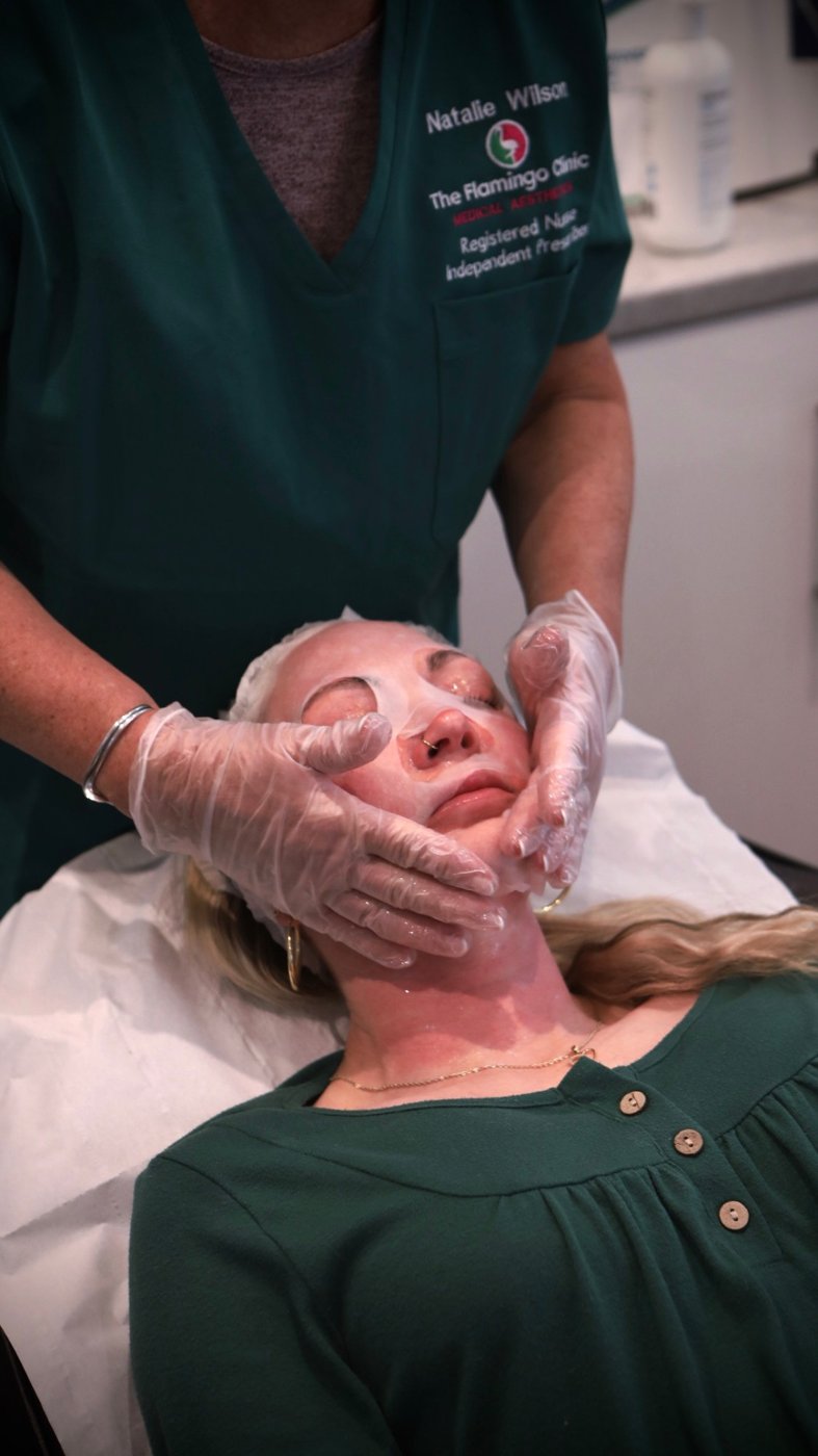 Sheet mask applied during a facial treatment