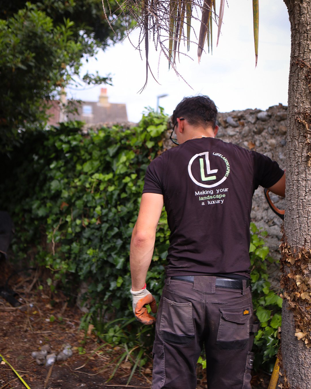 Luxe Landscaping team member at work